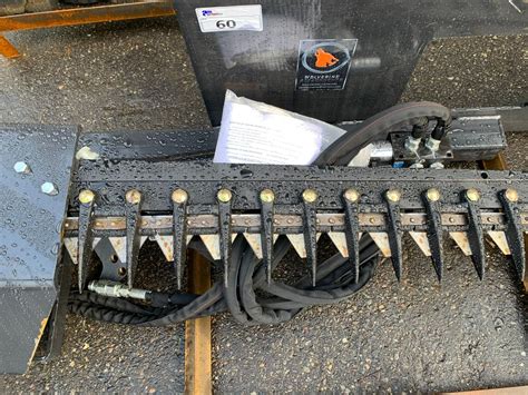 wolverine brush cutter skid steer|are wolverine attachments any good.